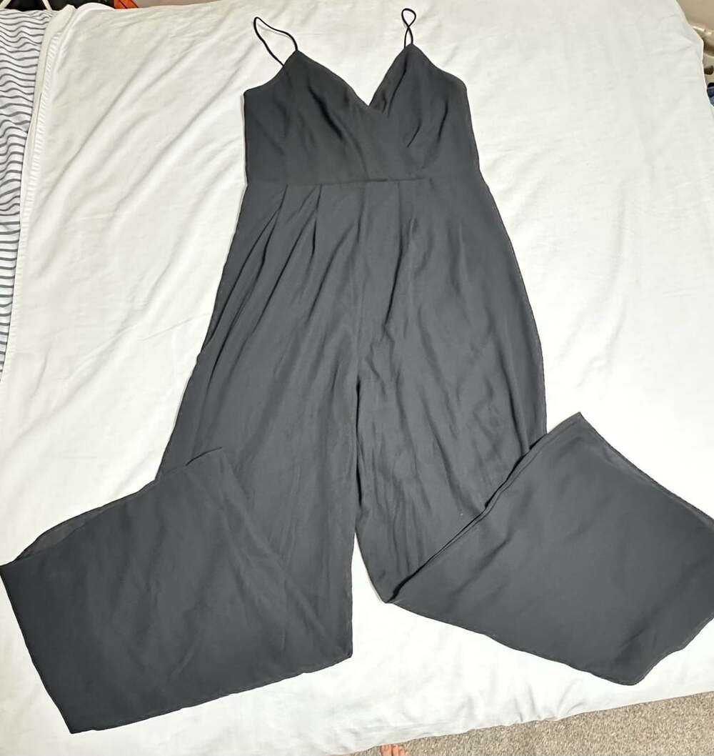 Audrey Parks francesca's Patrisha Black Wrap V-Neck Wide Leg Jumpsuit